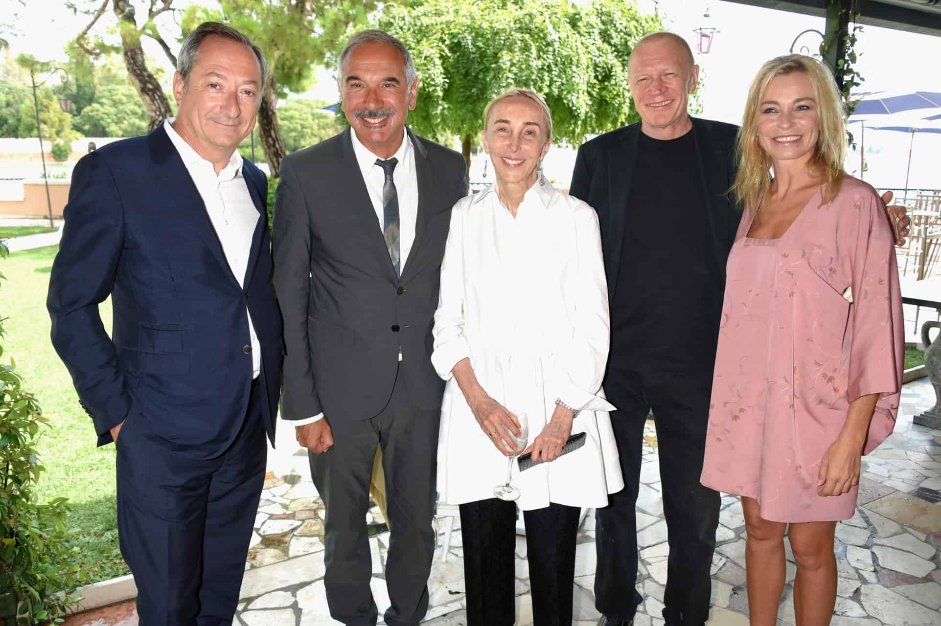 VENICE, ITALY - SEPTEMBER 01: (L-R) Stefano Sassi, Carlo Capasa, Carla Sozzani, a guest and Stefania Rocca Felice attend an intimate lunch hosted by Livia Firth, Carlo Capasa and Caroline Scheufele to announce Chopard as partner for The Green Carpet Fashion Awards at Hotel Cipriani on September 1, 2017 in Venice, Italy. (Photo by David M. Benett/Getty Images for Eco-Age) *** Local Caption *** Stefano Sassi; Carlo Capasa; Carla Sozzani; Stefania Rocca Felice